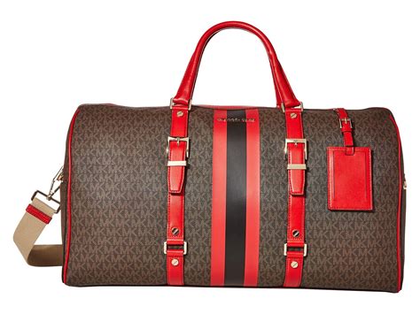 michael kors duffle handbag|michael kors travel suitcase.